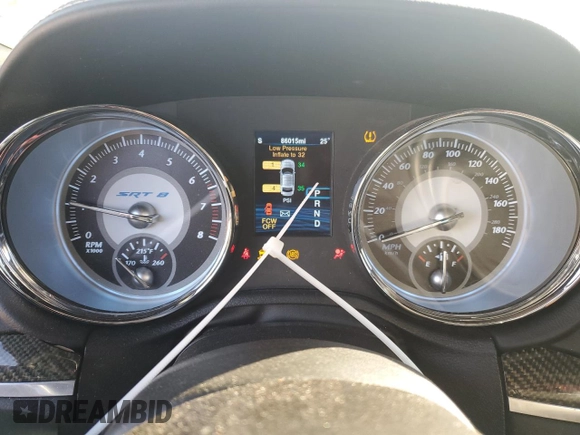 2013 Chrysler 300 SRT-8 with VIN 2C3CCAFJ8DH646483, listed as a Copart auction lot 83261144 with 86,015 mi miles and Salvage Title. Bid and sale history available at DreamBid. Image 9.