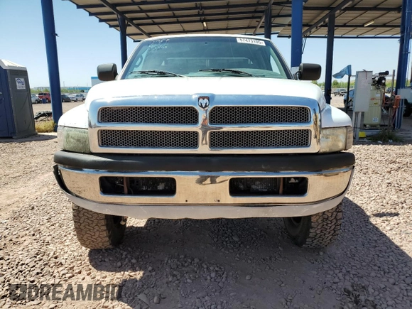 1999 Dodge 2500 with VIN 1B7KF2368XJ503590, listed as a Copart auction lot 57473105 with 401,040 mi miles and Clean title. Bid and sale history available at DreamBid. Image 5.