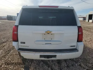 2018 Chevrolet Tahoe Premier with VIN 1GNSKCKC5JR196310, listed as a Copart auction lot 48050205 with 101,300 mi miles and Salvage title. Bid and sale history available at DreamBid. Image 6.