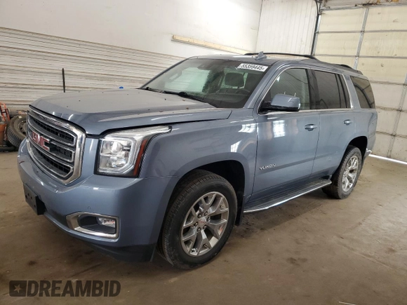 2015 GMC Yukon SLT z VIN 1GKS2BKC0FR630731, wystawiony jako Copart lot #55359445 z przebiegiem Nie podano mil oraz Szkoda całkowita • Salvage title. Historia ofert i sprzedaży dostępna na DreamBid. Obrazek 1.