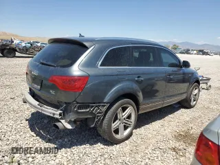 2014 Audi Q7 Premium Plus с VIN WA1LGAFE4ED009912, выставлен на аукционе Copart как лот 64220425 с пробегом 143 407 миль миль и Списание • Salvage title. История ставок и продаж доступна на DreamBid. Изображение 3.