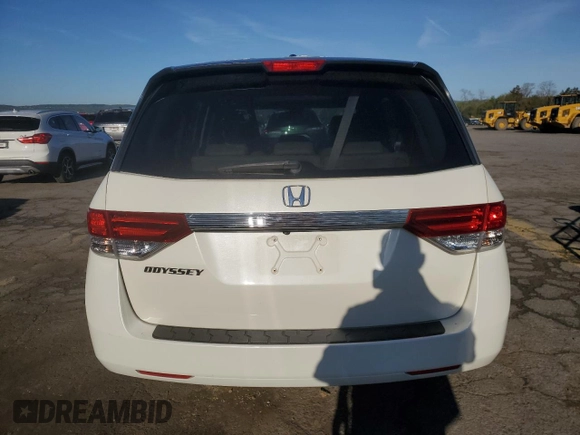2014 Honda Odyssey EX-L with VIN 5FNRL5H61EB005740, listed as a Copart auction lot 54663595 with 118,971 mi miles and Salvage Title. Bid and sale history available at DreamBid. Image 6.