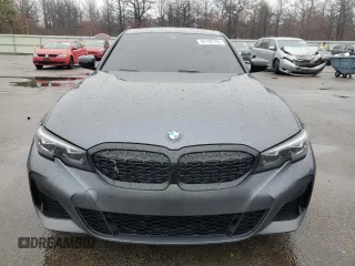 2022 BMW 3 Series M340i xDrive with VIN 3MW5U9J00N8C25719, listed as a Copart auction lot 48188795 with 21,969 mi miles and Salvage Title. Bid and sale history available at carsss.com. Image 5.