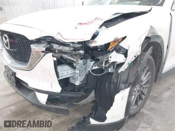 2017 Mazda CX-5 Touring with VIN JM3KFBCL9H0107589, listed as a IAAI auction lot 41241481 with 77,032 mi miles. Bid and sale history available at carsss.com. Image 6.