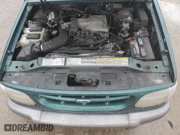 2000 Ford Explorer XLT z VIN 1FMDU83PXYZB03135, wystawiony jako Copart lot #45352705 z przebiegiem 228 604 mil mil oraz Szkoda całkowita • Salvage title. Historia ofert i sprzedaży dostępna na DreamBid. Obrazek 14.