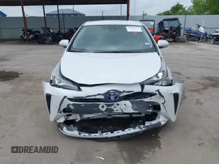 2022 Toyota Prius L Eco with VIN JTDKAMFUXN3157225, listed as a IAAI auction lot 39292379 with 59,333 mi miles and . Bid and sale history available at DreamBid. Image 6.