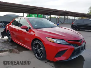 2019 Toyota Camry XSE with VIN 4T1B61HK0KU233466, listed as a IAAI auction lot 41035953 with 122,384 mi miles. Bid and sale history available at carsss.com. Image 1.