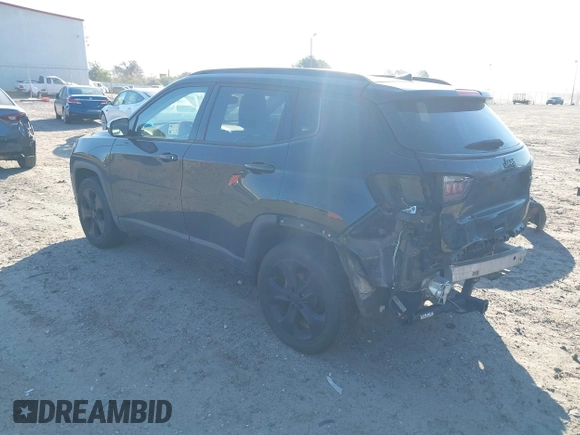 2019 Jeep Compass Latitude with VIN 3C4NJDBB1KT661261, listed as a IAAI auction lot 41883403 with 207,304 mi miles and . Bid and sale history available at DreamBid. Image 3.