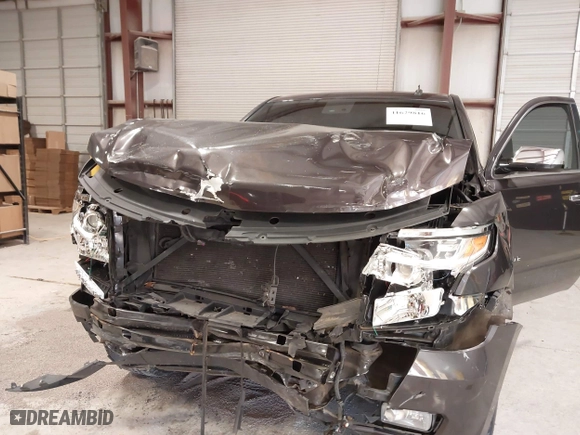 2015 Chevrolet Tahoe LTZ with VIN 1GNSCCKC2FR114442, listed as a IAAI auction lot 41629816 with 152,768 mi miles. Bid and sale history available at carsss.com. Image 6.