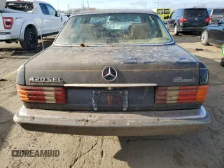 1986 Mercedes-Benz 420 with VIN WDBCA35D1GA265651, listed as a Copart auction lot 80223714 with 104,989 mi miles and Clean Title. Bid and sale history available at carsss.com. Image 6.