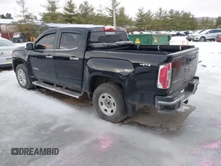 2015 GMC Canyon 4WD SLT with VIN 1GTG6CE39F1202730, listed as a IAAI auction lot 41510275 with 114,444 mi miles. Bid and sale history available at carsss.com. Image 3.