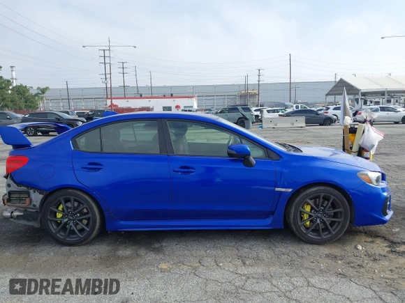 2020 Subaru WRX STI with VIN JF1VA2E63L9806965, listed as a IAAI auction lot 42342839 with 106,863 mi miles and . Bid and sale history available at DreamBid. Image 14.