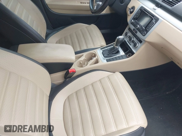 2014 Volkswagen CC R-Line with VIN WVWBP7AN7EE534565, listed as a IAAI auction lot 42477774 with 85,539 mi miles and . Bid and sale history available at DreamBid. Image 5.