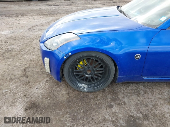 2004 Nissan 350Z Touring with VIN JN1AZ34E04T052916, listed as a IAAI auction lot 41450917 with 157,699 mi miles. Bid and sale history available at carsss.com. Image 6.