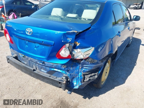 2009 Toyota Corolla with VIN JTDBL40E999021523, listed as a IAAI auction lot 42019856 with 194,011 mi miles. Bid and sale history available at carsss.com. Image 6.