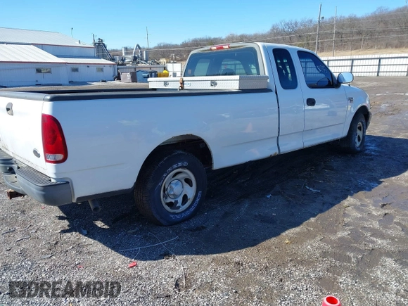 2002 Ford F-150 XL with VIN 1FTRX17L72NA76720, listed as a IAAI auction lot 41738935 with 92,506 mi miles. Bid and sale history available at carsss.com. Image 4.