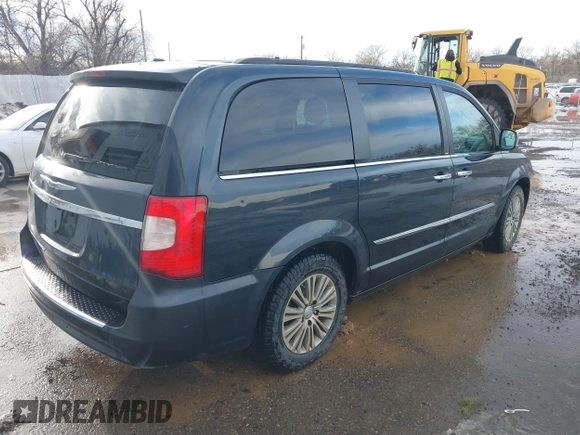 2014 Chrysler Town & Country Touring-L with VIN 2C4RC1CG4ER330072, listed as a IAAI auction lot 41533640 with 131,253 mi miles. Bid and sale history available at carsss.com. Image 4.