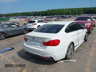 2015 BMW 4 Series 428i z VIN WBA3N3C55FK233907, wystawiony jako IAAI lot #42335053 z przebiegiem 45 000 mil mil oraz . Historia ofert i sprzedaży dostępna na DreamBid. Obrazek 4.
