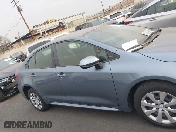 2023 Toyota Corolla Hybrid LE with VIN JTDBCMFE0P3023071, listed as a IAAI auction lot 41273943 with 26,250 mi miles. Bid and sale history available at carsss.com. Image 13.