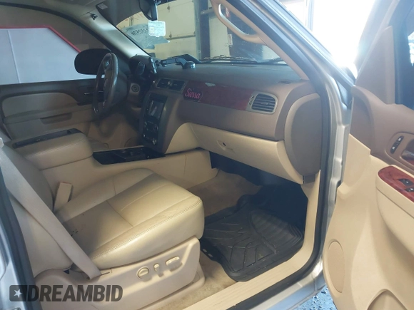 2012 GMC Yukon SLT with VIN 1GKS2CE03CR134986, listed as a IAAI auction lot 41352570 with 141,098 mi miles. Bid and sale history available at carsss.com. Image 5.