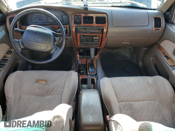 1997 Toyota 4Runner SR5 z VIN JT3HN86RXV0100711, wystawiony jako Copart lot #56483995 z przebiegiem 184 667 mil mil oraz Szkoda całkowita • Salvage title. Historia ofert i sprzedaży dostępna na DreamBid. Obrazek 8.