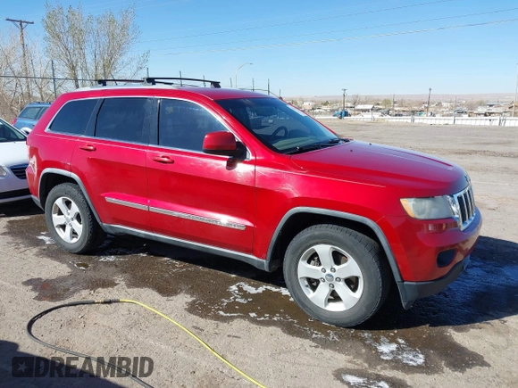 2011 Jeep Grand Cherokee 70th Anniversary with VIN 1J4RR4GT2BC703163, listed as a IAAI auction lot 41763149 with 184,523 mi miles. Bid and sale history available at carsss.com. Image 13.