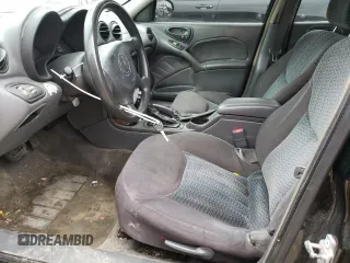 2004 Pontiac Grand Am SE with VIN 1G2NE52F34M672059, listed as a Copart auction lot 47394945 with 169,349 mi miles and Salvage Title. Bid and sale history available at carsss.com. Image 7.