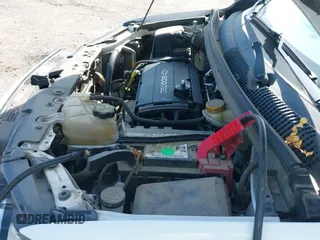 2015 Chevrolet Sonic LS z VIN 1G1JB6SH2F4164123, wystawiony jako IAAI lot #43077617 z przebiegiem 138 423 mil mil oraz . Historia ofert i sprzedaży dostępna na DreamBid. Obrazek 12.