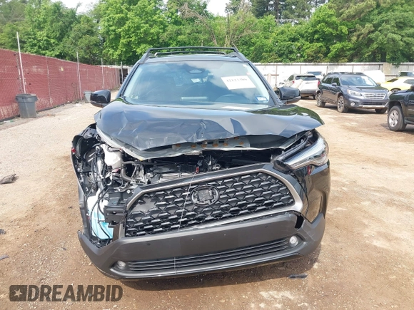 2024 Toyota Corolla Cross XLE z VIN 7MUDAAAG4RV099759, wystawiony jako IAAI lot #42123306 z przebiegiem 6 259 mil mil oraz . Historia ofert i sprzedaży dostępna na DreamBid. Obrazek 13.