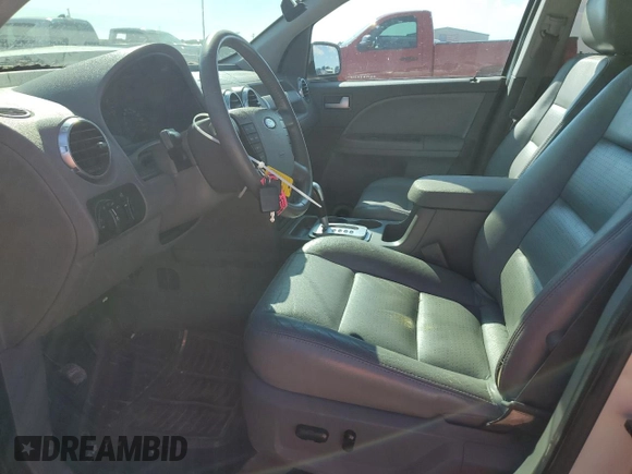 2005 Ford Freestyle SEL z VIN 1FMDK02135GA10159, wystawiony jako Copart lot #72774784 z przebiegiem 146 096 mil mil oraz Szkoda całkowita • Salvage title. Historia ofert i sprzedaży dostępna na DreamBid. Obrazek 7.