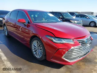 2019 Toyota Avalon Hybrid Limited with VIN 4T1B21FB8KU010221, listed as a IAAI auction lot 41470592 with 100,869 mi miles. Bid and sale history available at carsss.com. Image 1.