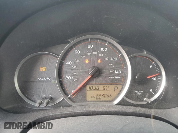 2013 Toyota Yaris L z VIN JTDJTUD33DD571231, wystawiony jako Copart lot #75826024 z przebiegiem 224 036 mil mil oraz Szkoda całkowita • Salvage title. Historia ofert i sprzedaży dostępna na DreamBid. Obrazek 9.