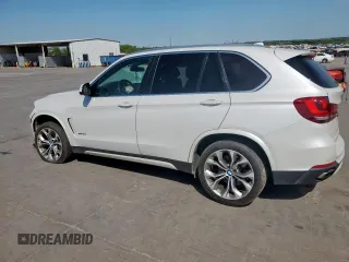 2017 BMW X5 xDrive50i with VIN 5UXKR6C32H0U13460, listed as a Copart auction lot 51462745 with 97,749 mi miles and Salvage title. Bid and sale history available at DreamBid. Image 2.