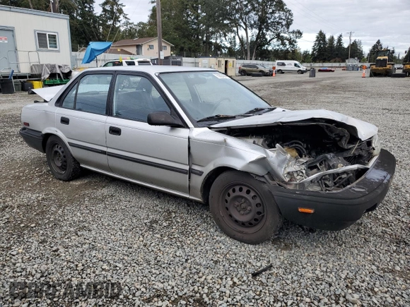1991 Toyota Corolla z VIN 1NXAE94A8MZ234510, wystawiony jako Copart lot #75002404 z przebiegiem 188 051 mil mil oraz Szkoda całkowita • Salvage title. Historia ofert i sprzedaży dostępna na DreamBid. Obrazek 4.