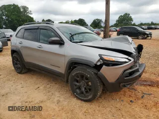2016 Jeep Cherokee Trailhawk with VIN 1C4PJMBS4GW236966, listed as a Copart auction lot 63190565 with 101,017 mi miles and Salvage title. Bid and sale history available at DreamBid. Image 4.