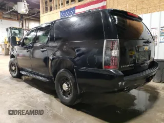 2013 Chevrolet Suburban with VIN 1GNWK5EG4DR246825, listed as a Copart auction lot 56764205 with 162,459 mi miles and Salvage title. Bid and sale history available at DreamBid. Image 2.