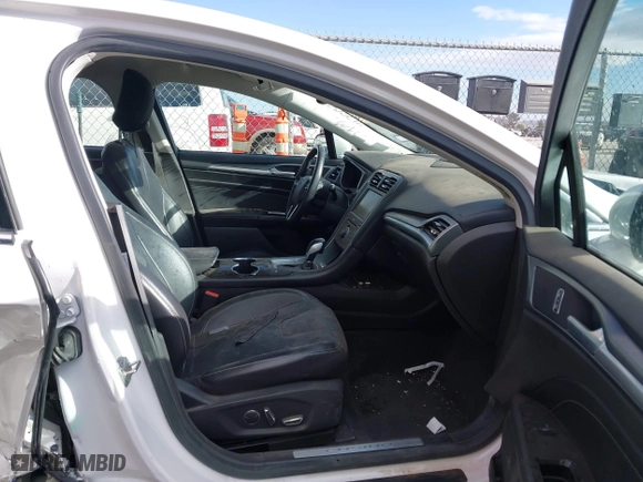 2015 Ford Fusion Titanium Hybrid with VIN 3FA6P0RU9FR308973, listed as a IAAI auction lot 41754320 with 82,686 mi miles. Bid and sale history available at carsss.com. Image 5.