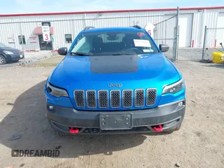 2021 Jeep Cherokee Trailhawk with VIN 1C4PJMBX4MD222987, listed as a IAAI auction lot 41771808 with 52,533 mi miles and . Bid and sale history available at DreamBid. Image 12.