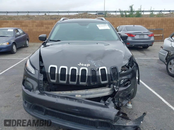 2014 Jeep Cherokee Latitude z VIN 1C4PJLCS2EW217130, wystawiony jako IAAI lot #41782039 z przebiegiem 129 080 mil mil oraz . Historia ofert i sprzedaży dostępna na DreamBid. Obrazek 12.