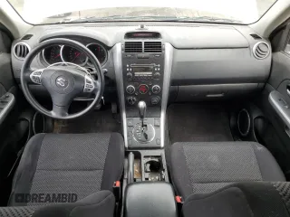 2008 Suzuki Grand Vitara w/Spare & Cargo Covers with VIN JS3TD941784100899, listed as a Copart auction lot 62581725 with 104,502 mi miles and Salvage title. Bid and sale history available at DreamBid. Image 8.