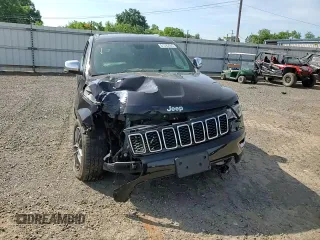 2018 Jeep Grand Cherokee Limited with VIN 1C4RJFBG9JC299621, listed as a Copart auction lot 61395695 with 87,952 mi miles and Salvage title. Bid and sale history available at DreamBid. Image 14.