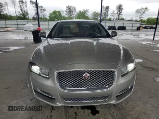 2016 Jaguar XJ Portfolio with VIN SAJWA2G70G8V93006, listed as a Copart auction lot 52324635 with 123,690 mi miles and Salvage Title. Bid and sale history available at DreamBid. Image 5.