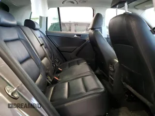 2011 Volkswagen Tiguan SEL z VIN WVGBV7AXXBW559663, wystawiony jako Copart lot #52307905 z przebiegiem 125 263 mil mil oraz Szkoda całkowita • Salvage title. Historia ofert i sprzedaży dostępna na DreamBid. Obrazek 10.