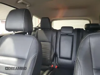 2014 Ford Escape Titanium с VIN 1FMCU0J98EUA35069, выставлен на аукционе Copart как лот 58369635 с пробегом 92 323 миль миль и Списание • Salvage title. История ставок и продаж доступна на DreamBid. Изображение 10.