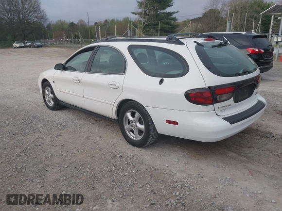 2003 Ford Taurus SE z VIN 1FAFP58S63A158422, wystawiony jako IAAI lot #41933813 z przebiegiem 71 990 mil mil oraz . Historia ofert i sprzedaży dostępna na DreamBid. Obrazek 3.