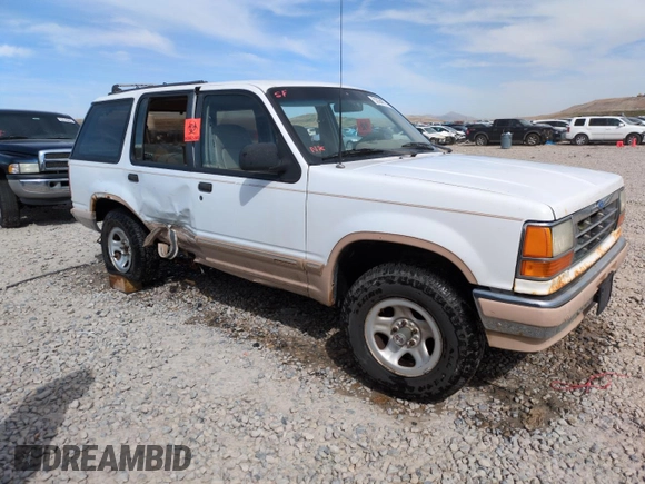 1992 Ford Explorer Eddie Bauer with VIN 1FMDU34X2NUE11927, listed as a Copart auction lot 52094875 with 53,449 mi miles and Salvage title. Bid and sale history available at DreamBid. Image 4.