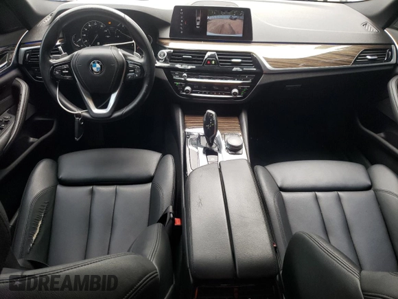 2018 BMW 5 Series 530i with VIN WBAJA5C53JG898430, listed as a Copart auction lot 54243195 with 129,854 mi miles and Salvage title. Bid and sale history available at DreamBid. Image 8.