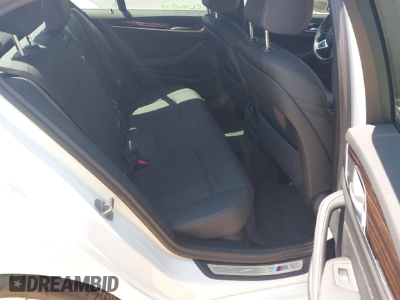 2023 BMW 5 Series 530i with VIN WBA53BH02PWY19741, listed as a IAAI auction lot 42003919 with 15,947 mi miles and . Bid and sale history available at DreamBid. Image 8.