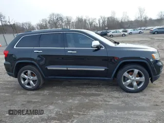 2013 Jeep Grand Cherokee Overland with VIN 1C4RJECG5DC621149, listed as a IAAI auction lot 41255140 with 157,355 mi miles. Bid and sale history available at carsss.com. Image 13.