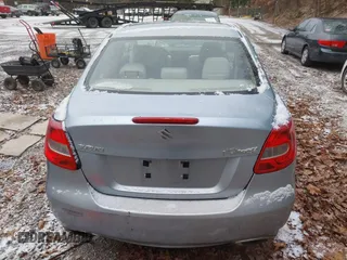 2010 Suzuki Kizashi SE with VIN JS2RE9A30A6101436, listed as a IAAI auction lot 40998132 with 140,786 mi miles and . Bid and sale history available at DreamBid. Image 17.